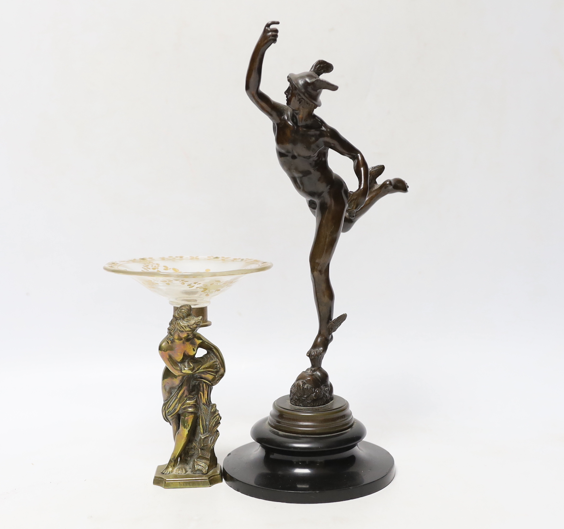 A small bronze model of Hermes, after the Antique, together with a small tazza with cast brass female nude, bronze 27cm (2)